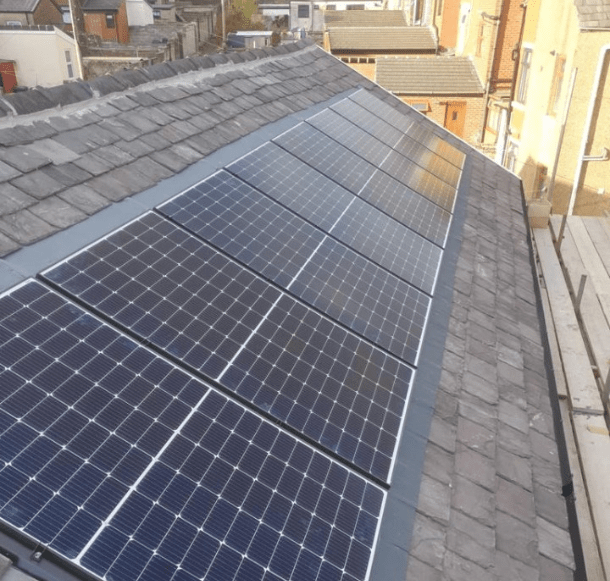 an 8x2 set of domestic solar panels fitted on one side of a roof